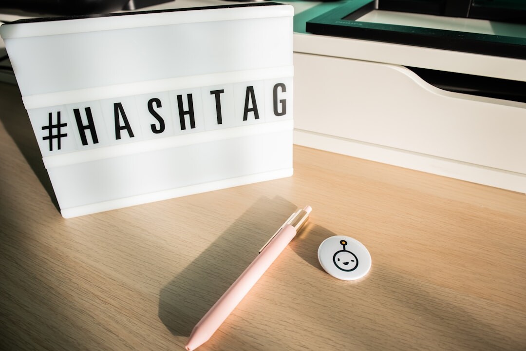 Detective notebook with fountain pen, magnifying glass and coffee cup on a desk