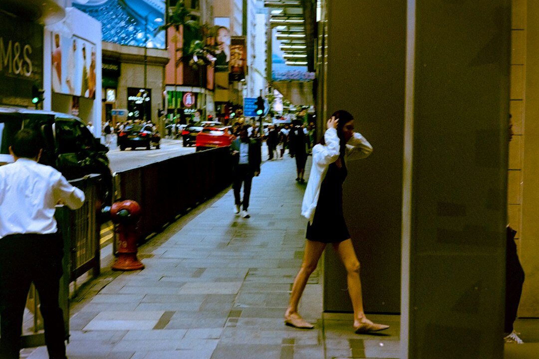 store detective watching shoppers
